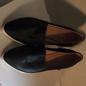 Black leather loafers.